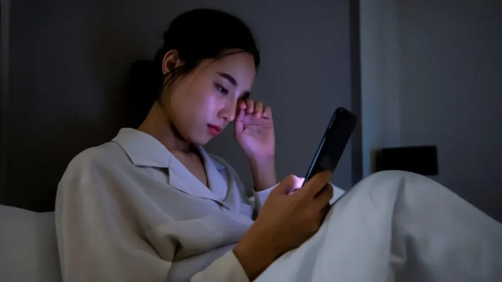 Foods for Better Sleep: Eat Your Way to a Restful Night 4 a girl tracking her sleep